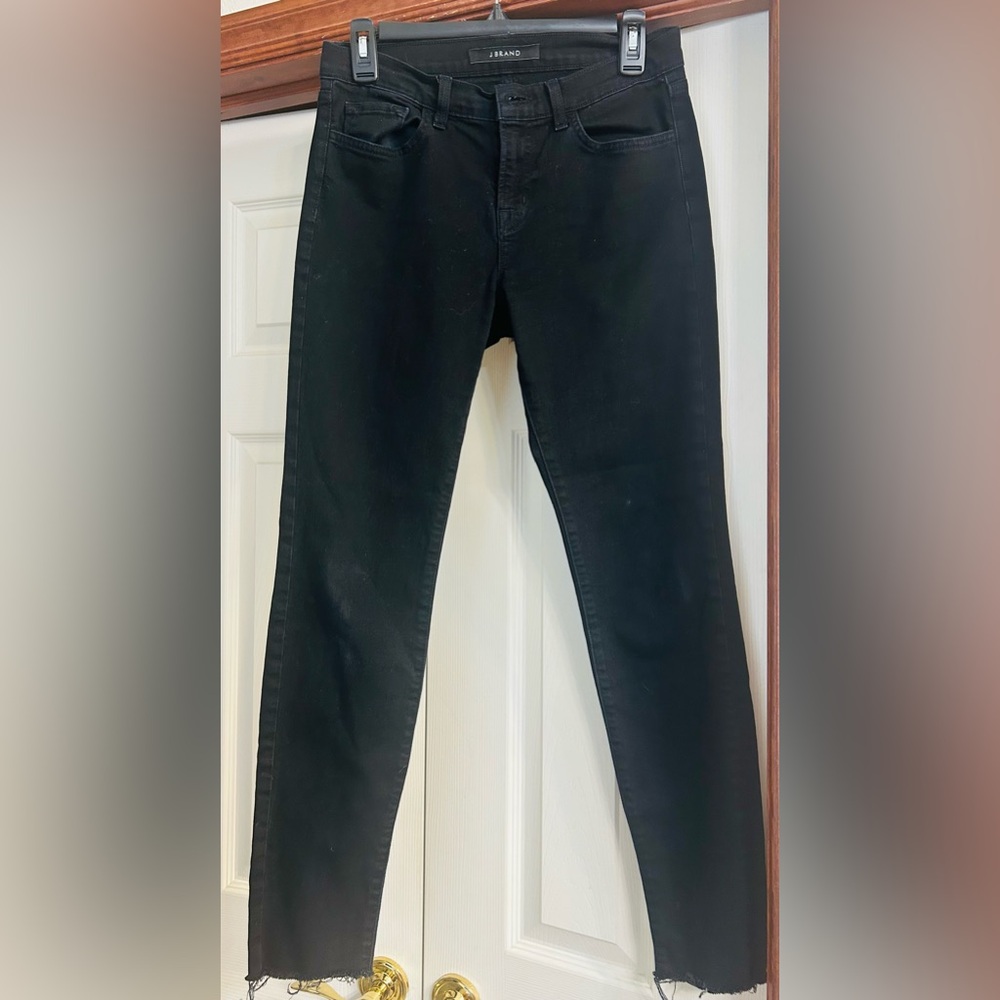 J Brand Women’s Skinny Jeans in Shadow Black with frayed ankles